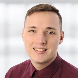 Das Mitarbeiterbild von Johannes Fießinger. Der ist Produkt/Projektmanager im Digitalbereich der mgo fachverlage