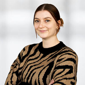 Das Mitarbeiterbild von Senja Treutler. Sie arbeitet als Online Marketing Managerin.