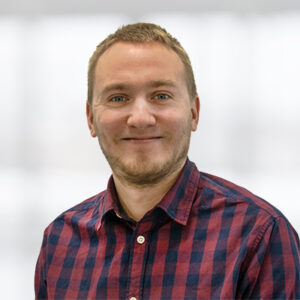 Das Mitarbeiterbild von Mirko Arioli. Er ist als Digital Product Manager für die mgo fachverlage im Bereich Digital tätig.